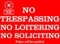 NO TRESPASSING/ NO LOITERING/ NO SOLICITING  sign